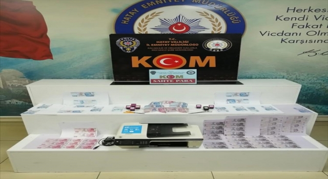 Hatay’da sahte para basıp piyasaya sürdükleri iddiasıyla 2 zanlı yakalandı