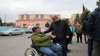 Okay depremzedeleri ziyaret etti
